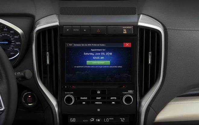 In-vehicle touchscreen display asking for scheduling confirmation of a Subaru service appointment