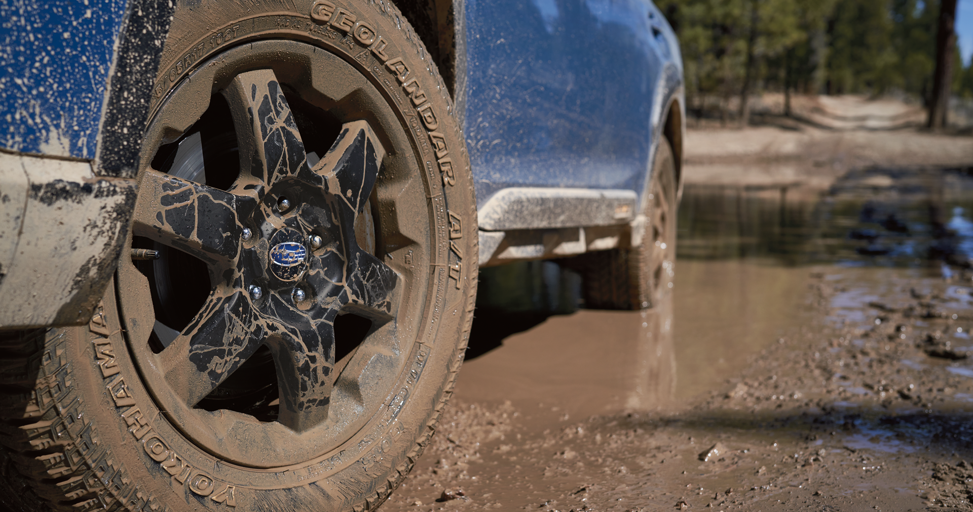 A close-up of the 17-inch off-road wheels and all-terrain Yokohama GEOLANDAR® tires on the 2023 Outback Wilderness. | Bergstrom Subaru Oshkosh in Oshkosh WI